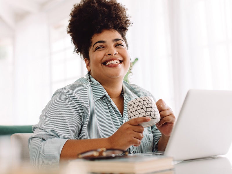 AFCU member managing free checking from home desktop