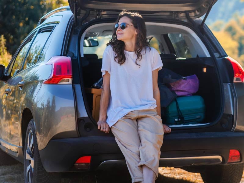 New car parked in driveway after AFCU auto-loan closing