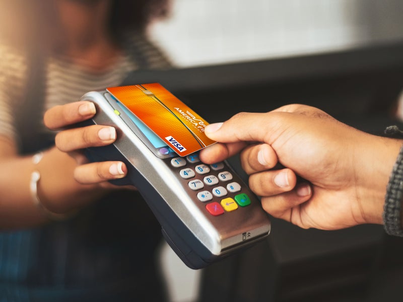 AFCU member receiving Secured Visa card for building credit
